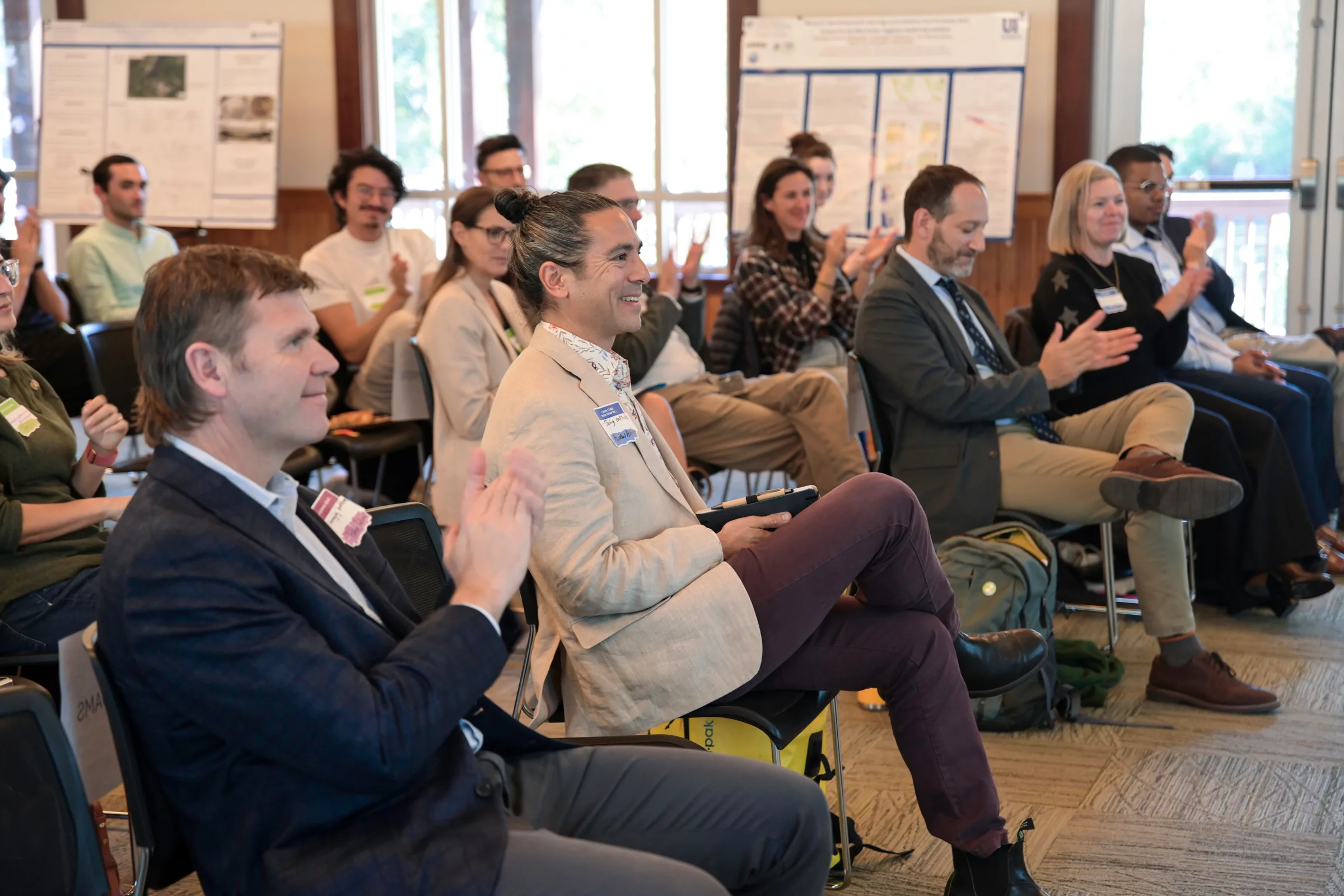View of some attendees from the side of the Austin Cary venue as they listen to a speaker at the 2025 CCS Summit.